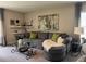 Comfortable living room features a plush sofa, stylish coffee table, and decorative accents at 7737 Sail Clover Ln, Zephyrhills, FL 33540