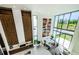 A stylish living room with high ceilings and an open-concept design at 88 Avonwood, Tampa, FL 33625