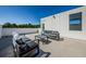 Roof deck featuring seating with views of the sky and trees at 88 Avonwood, Tampa, FL 33625