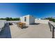 Expansive roof deck featuring an outdoor dining area and lounge seating, perfect for entertaining with panoramic views at 88 Avonwood, Tampa, FL 33625
