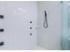 This shower features multi-jet fixtures and modern tile at 88 Avonwood, Tampa, FL 33625