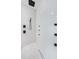 Modern shower with overhead and wall shower heads, and contrasting fixtures at 88 Avonwood, Tampa, FL 33625