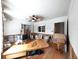 Unfurnished living room with wood floors and a ceiling fan at 101 Gulf Blvd, Belleair Beach, FL 33786