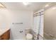 Cozy bathroom with tiled walls, standard fixtures, and a functional layout, ideal for everyday use at 110 Hammock Pine Blvd # 110, Clearwater, FL 33761