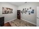 Versatile office featuring aircraft décor, with dark storage shelving, and a gallery wall of pictures at 11465 June Briar Loop, San Antonio, FL 33576