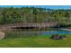 Charming view of the wooden walking bridge over the pond at 11465 June Briar Loop, San Antonio, FL 33576