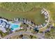 Aerial view of a community pool, docks and boats along the waterfront at 11590 Shipwatch Dr # 342, Largo, FL 33774