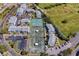 Aerial view of condo community with tennis courts and parking lots at 11590 Shipwatch Dr # 342, Largo, FL 33774