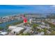 A waterfront condo complex surrounded by lush greenery, a tranquil lake and beautiful beaches at 11590 Shipwatch Dr # 342, Largo, FL 33774