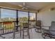 Cozy balcony features a seating area with views of the cityscape and surrounding greenery at 11590 Shipwatch Dr # 342, Largo, FL 33774