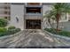 A well-maintained building entrance with landscaping and clear signage welcomes visitors at 11590 Shipwatch Dr # 342, Largo, FL 33774
