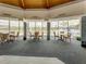 Clubhouse indoor seating area with a view of the pool at 11590 Shipwatch Dr # 342, Largo, FL 33774