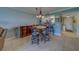 Open dining area with bar seating and easy access to the kitchen at 11590 Shipwatch Dr # 342, Largo, FL 33774