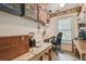Functional workshop with organized storage, workbench, and natural light perfect for hobbies at 1187 Mistwood Dr, Tarpon Springs, FL 34688