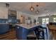 Stylish kitchen featuring a large island, modern appliances, and open layout for easy entertaining at 14043 E Parsley Dr, Madeira Beach, FL 33708