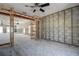Open concept living room with updated lighting and ceiling fan at 14043 E Parsley Dr, Madeira Beach, FL 33708