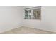 Bright bedroom features a window bringing natural light into the space at 1552 Pleasant Rd # J4, Bradenton, FL 34207