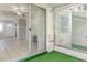 Patio space with glass sliding door and artificial grass at 1552 Pleasant Rd # J4, Bradenton, FL 34207