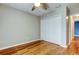 Cozy bedroom featuring hardwood floors and ample closet space, perfect for storage at 16403 Bonneville Dr, Tampa, FL 33624