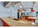 Kitchen with granite countertops, stainless steel appliances and an open floor plan at 16403 Bonneville Dr, Tampa, FL 33624