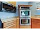 Kitchen features stainless steel appliances, including double ovens and a microwave at 16403 Bonneville Dr, Tampa, FL 33624