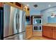 Bright kitchen with stainless appliances, light wood cabinetry, and hardwood flooring at 16403 Bonneville Dr, Tampa, FL 33624