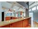 Bright kitchen features a vaulted ceiling, granite countertops and modern stainless steel appliances at 16403 Bonneville Dr, Tampa, FL 33624