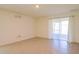 Spacious living room featuring tile floors and bright lighting at 16805 Delia St, Wimauma, FL 33598