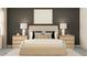 This primary bedroom features a large bed, two nightstands with lamps, and an art piece above the bed at 18448 Serene Lake Loop, Lutz, FL 33548