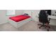 Comfortable bedroom features a large bed, desk, and neutral carpet at 2232 Harris Hawk, Ruskin, FL 33570