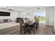 Dining area in an open floorplan with access to the backyard at 2232 Harris Hawk, Ruskin, FL 33570