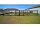 A fenced dog park within the community, providing a safe and enjoyable space for residents and their pets at 2232 Harris Hawk, Ruskin, FL 33570