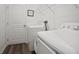 Well-lit laundry room with white washer and dryer, plus a convenient storage shelf at 2232 Harris Hawk, Ruskin, FL 33570