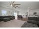 Inviting living area leading to an adjacent dining space and stylish kitchen at 2232 Harris Hawk, Ruskin, FL 33570