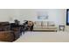 Bright living room with neutral walls and comfortable furniture at 2348 Shelley St # 2, Clearwater, FL 33765