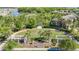 A green community park features palm trees, picnic areas, walking paths and an outdoor movie screen at 28642 Tranquil Lake Cir, Wesley Chapel, FL 33543