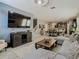 Spacious open-concept living area with connected kitchen and dining spaces at 28642 Tranquil Lake Cir, Wesley Chapel, FL 33543