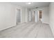 Bedroom with carpet, neutral walls, and doors to closet and bathroom at 2895 Deer Pine Trl, Land O Lakes, FL 34638