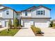 Beautiful townhome with a one car garage and complemented by neat landscaping at 2895 Deer Pine Trl, Land O Lakes, FL 34638