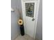 Bathroom door decorated with a sign and dried flowers at 2910 Lichen Ln # B, Clearwater, FL 33760
