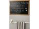 Chalkboard with a motivational quote and a hand towel in the bathroom at 2910 Lichen Ln # B, Clearwater, FL 33760