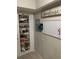 Pantry area with spices, food, storage and an event calendar at 2910 Lichen Ln # B, Clearwater, FL 33760