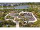 Community playground with modern play equipment, shaded area, and landscaped surroundings at 33736 Ocean Spray Ln, Wesley Chapel, FL 33543