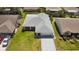 Aerial view of the residence showcasing the layout, landscaping, and surrounding neighborhood at 3948 Tarpon Pointe Cir, Palm Harbor, FL 34684
