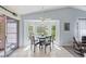 Eat-in kitchen dining area boasts a large bay window offering abundant natural light and outdoor views at 3948 Tarpon Pointe Cir, Palm Harbor, FL 34684