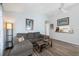 Living room features an open concept design, seamlessly connecting to the kitchen through a pass through at 3948 Tarpon Pointe Cir, Palm Harbor, FL 34684