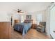 Relaxing bedroom with neutral walls, a ceiling fan, and an ensuite bath at 3948 Tarpon Pointe Cir, Palm Harbor, FL 34684
