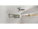 Bright bedroom with large windows offering ample natural light and modern fan at 4036 Church Creek Pt, Largo, FL 33774