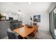 Open concept dining area flows into the kitchen; perfect for entertaining at 4036 Church Creek Pt, Largo, FL 33774