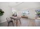 Inviting living area boasts views of the waterway, comfortable seating, and lots of natural light at 4036 Church Creek Pt, Largo, FL 33774